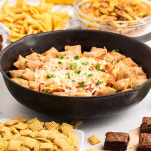 Skillet Pizza Rolls and Pizza Dip on a snack table ready to eat.