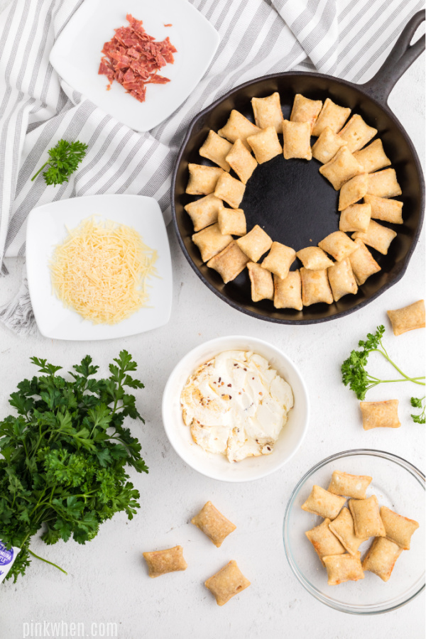 Circles of pizza rolls for pizza dip recipe.
