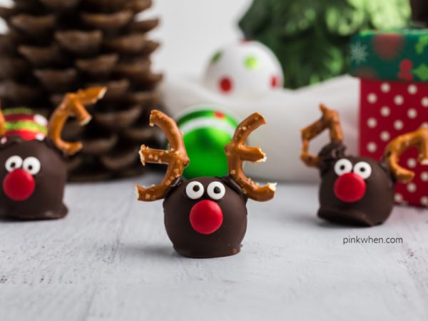 Reindeer OREOTruffles arranged around Christmas decor. 
