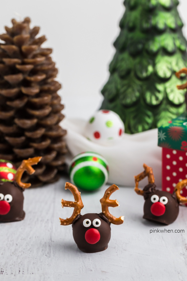 OREO Reindeer truffles arranged around a cute Christmas background. 