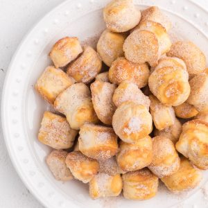 Air Fryer Donut Holes on a white plate.