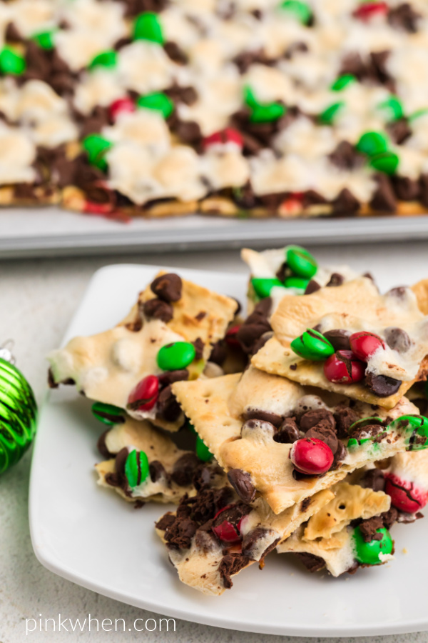 Christmas Crack Saltines on a white plate ready to eat.