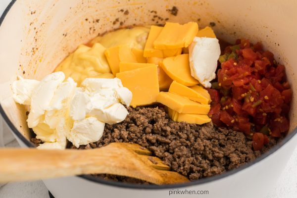 Cheese, soup, and Rotel aded to the taco meat mixture. 