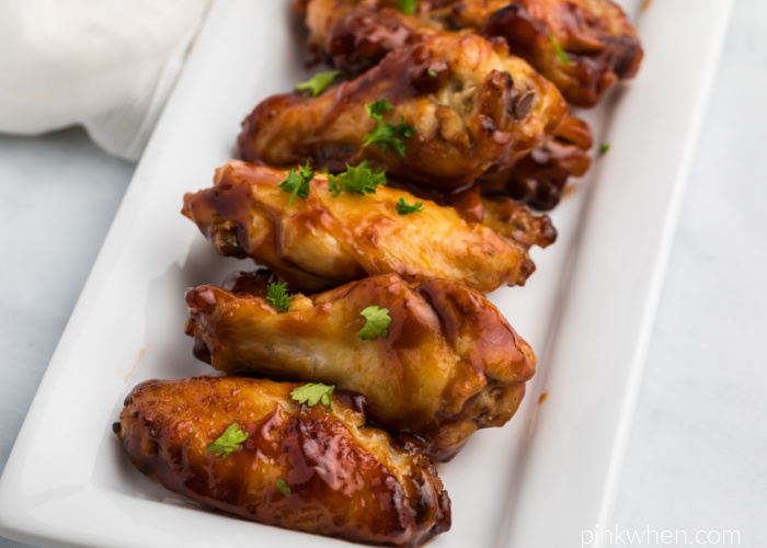 Air Fried BBQ Chicken Wings on a white serving plate. 