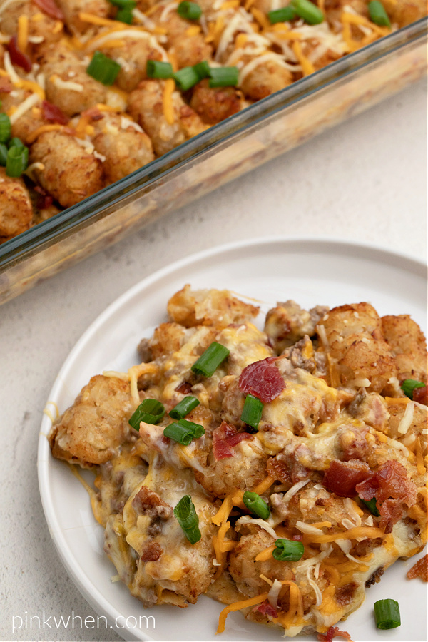 Bacon Cheeseburger Tater Tot Casserole on a plate ready to serve. 