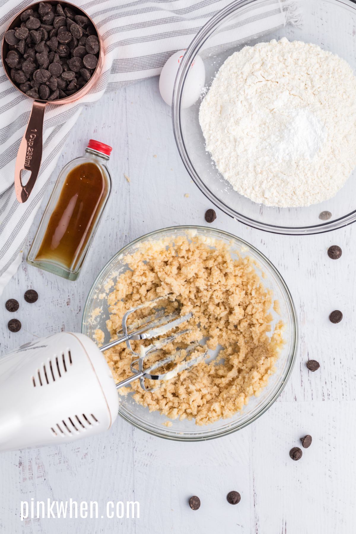 Butter and sugars creamed together with a handheld mixer.