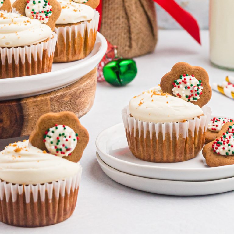 Gingerbread cupcakes with cream cheese frosting, ready to eat.