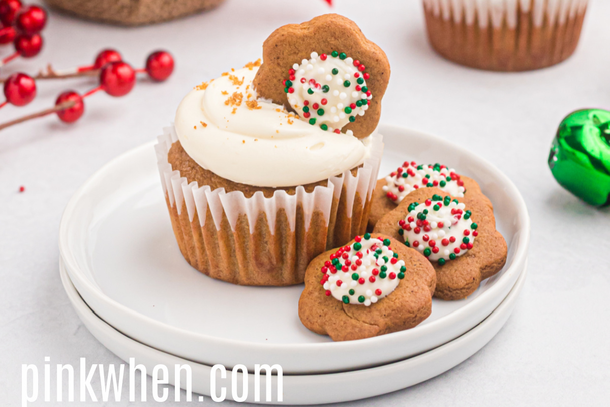 Gingerbread cupcakes on a aplate with cookies. 