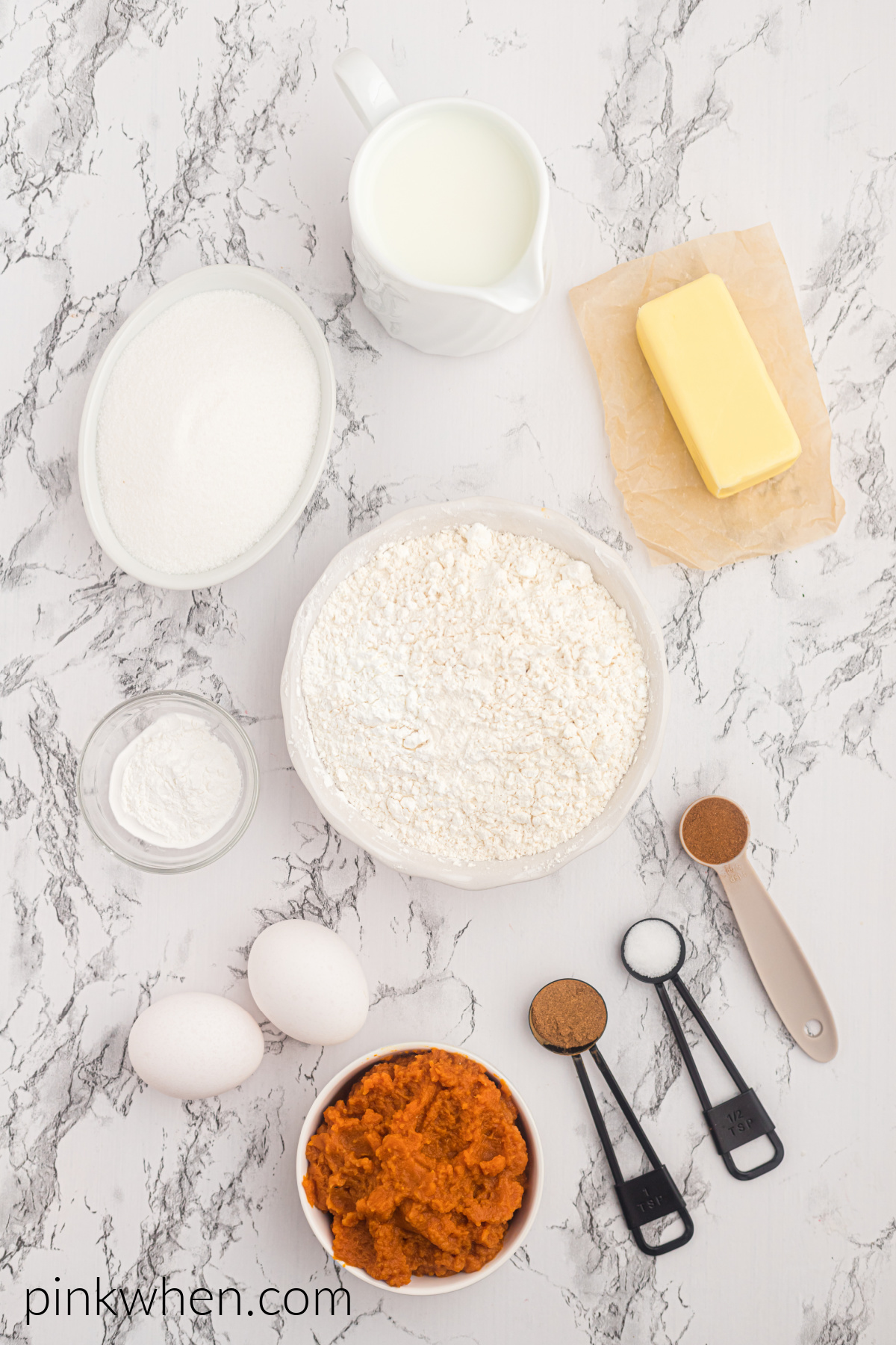 Ingredients needed to make pumpkin spice cupcakes. 