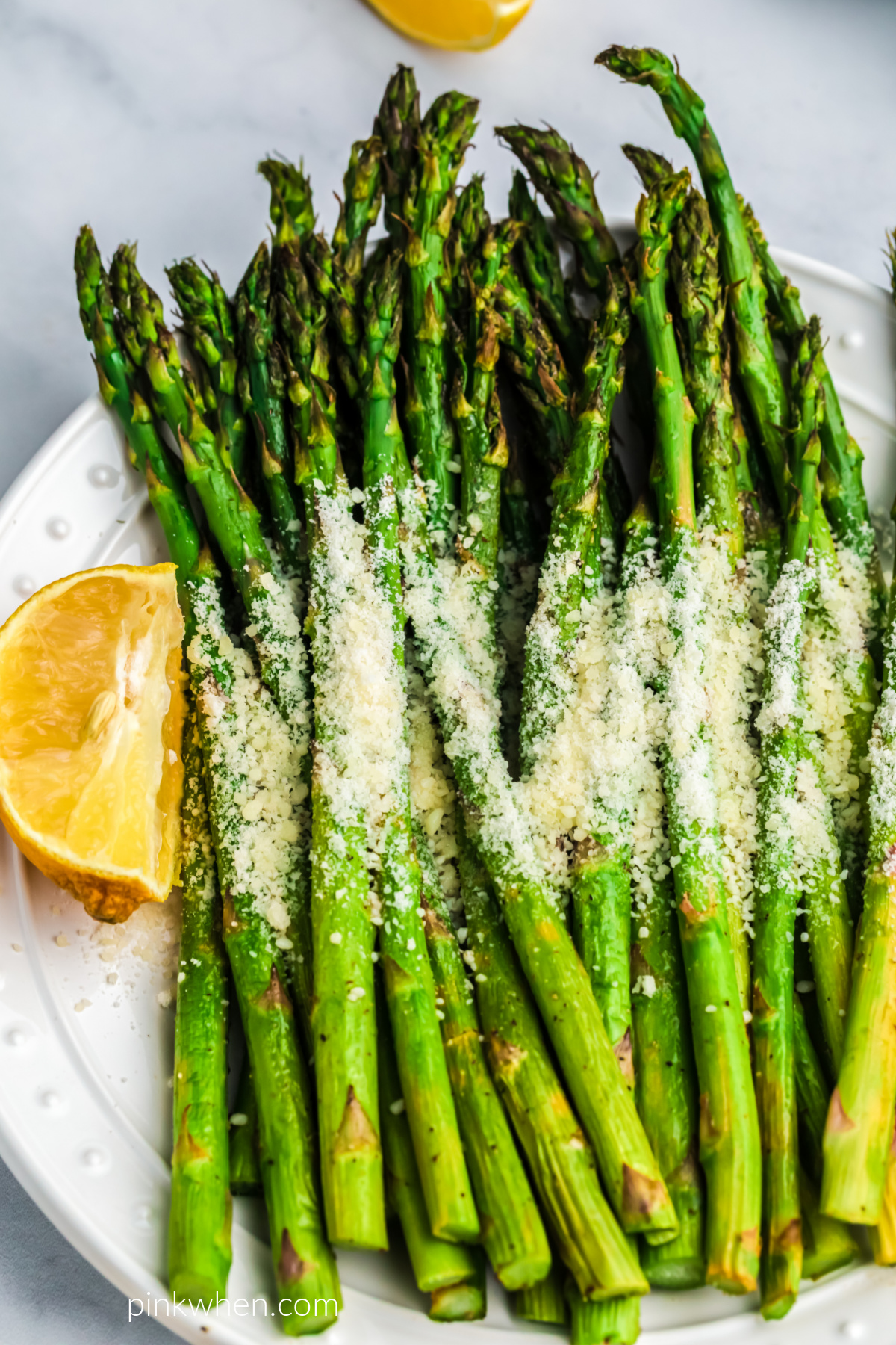 Air Fried Asparagus on a white plate. 