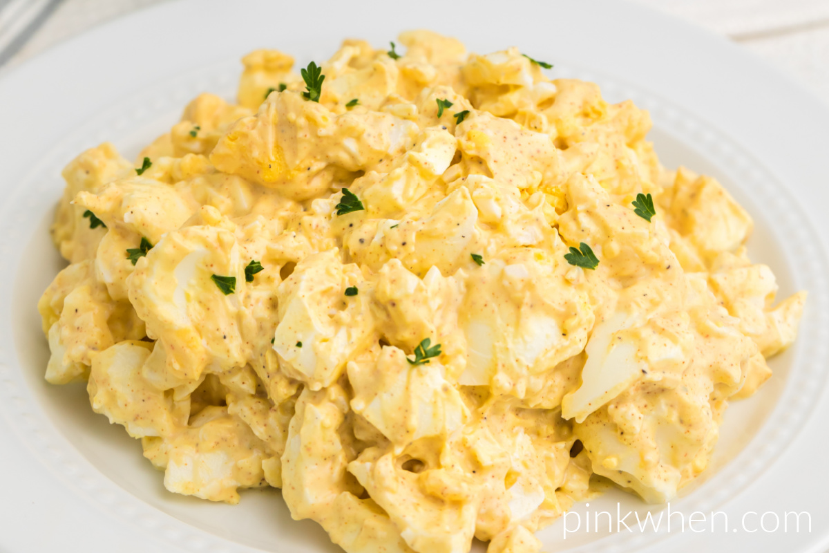Close up photo of egg salad on a plate ready to be served. 