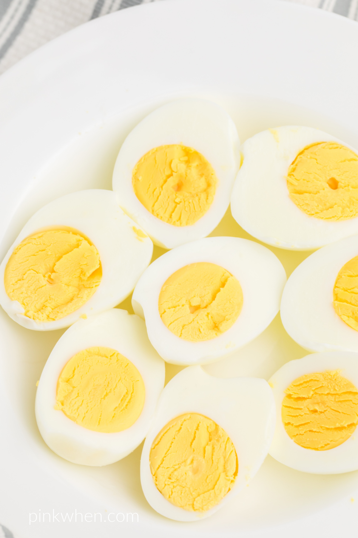 Boiled eggs cut in half that were made in the air fryer. 