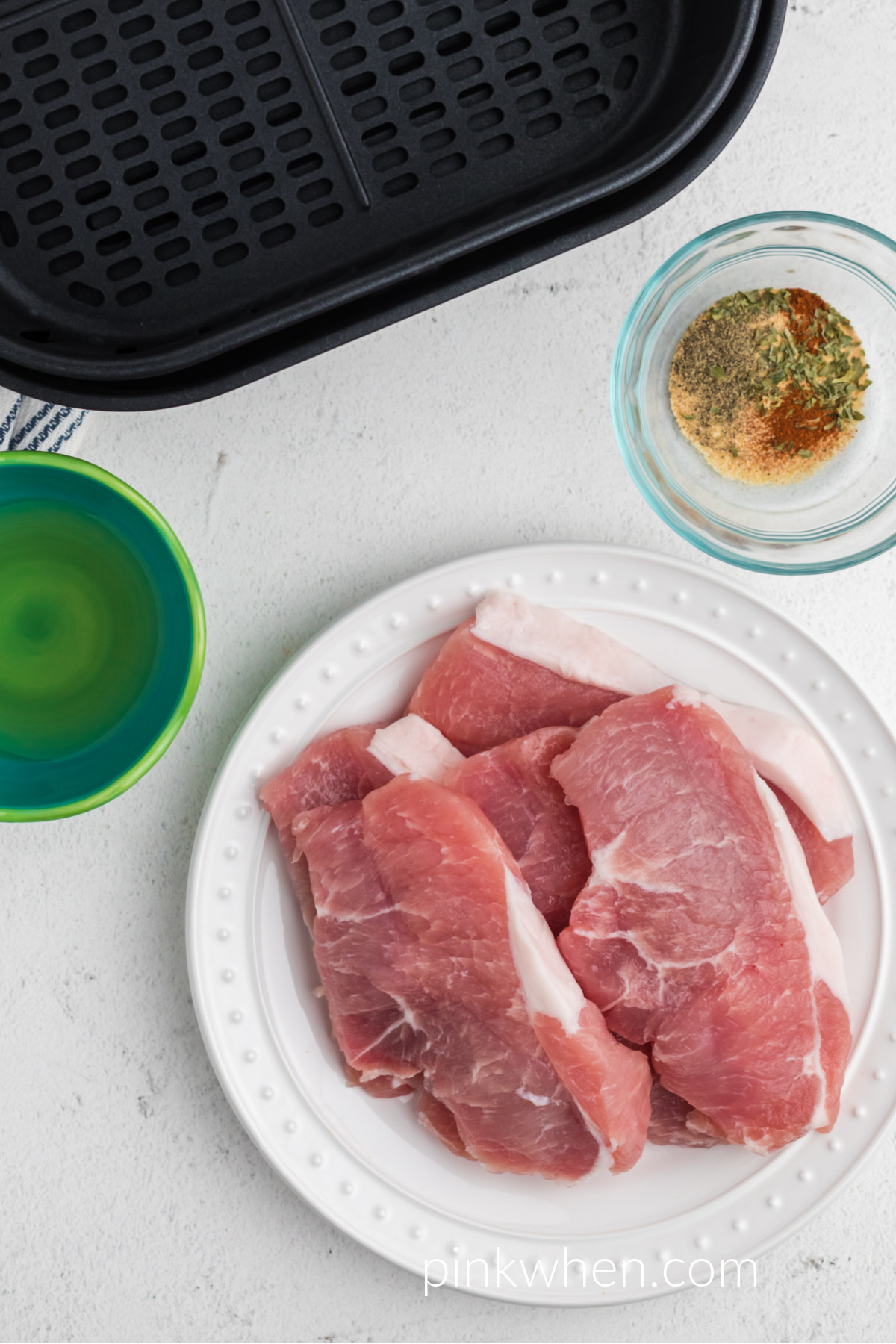ingredients needed to make air fryer pork chops with no breading. 