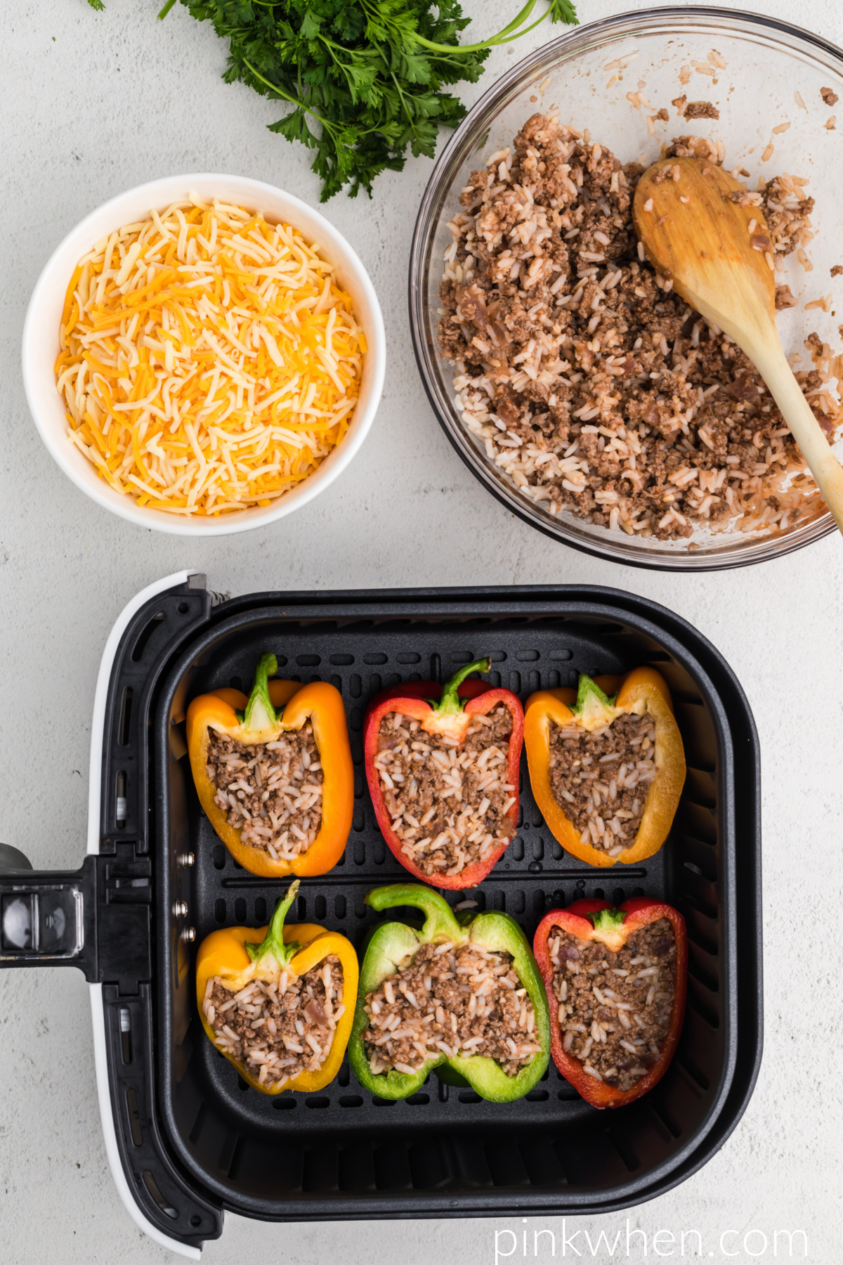 Pepper stuffed with meat mixture and placed in a single layer in the basket of the air fryer. 