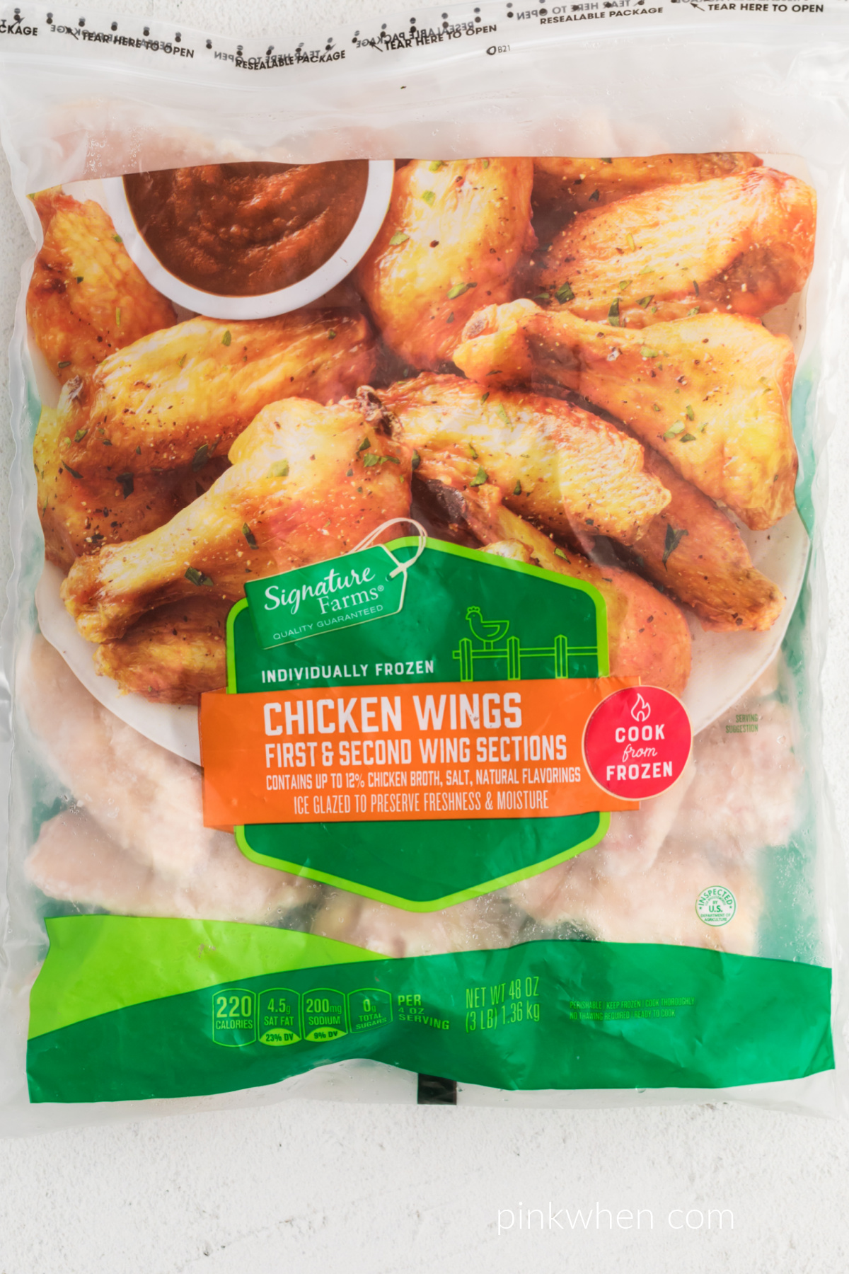 Frozen chicken wings in a bag ready to be cooked. 