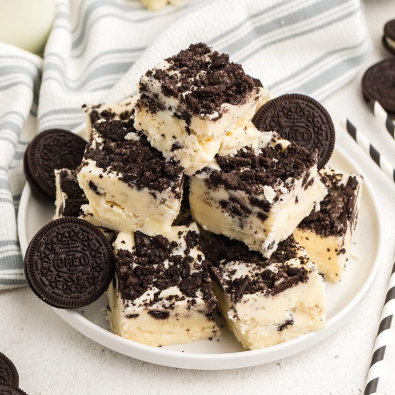 Stacked OREO Cookie Fudge on a white plate