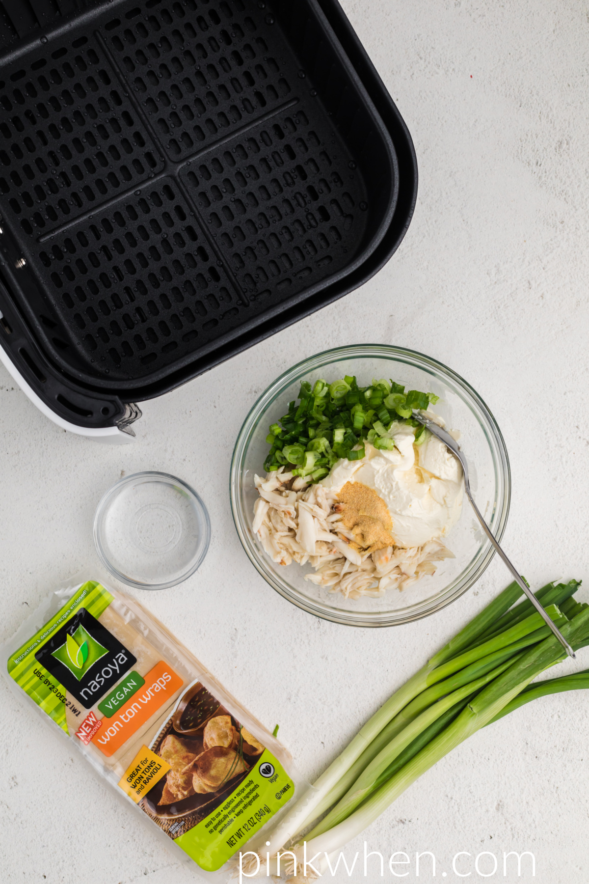 Crab rangoon ingredients combined in a bowl ready to mix. 