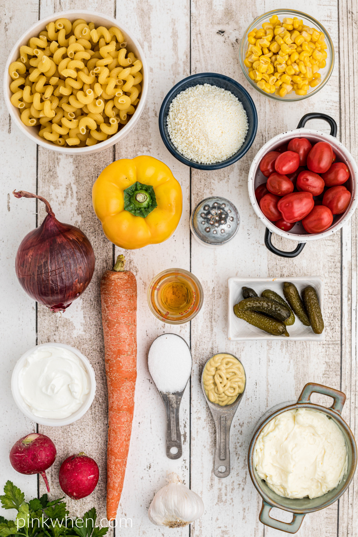 Ingredients needed to make a delicious summer pasta salad. 