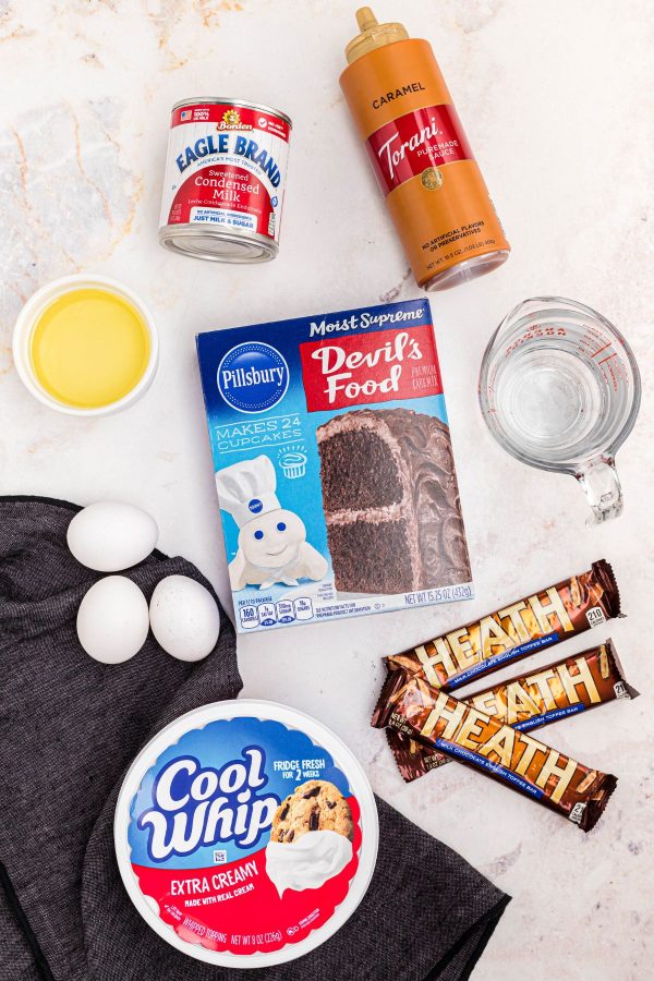 Ingredients needed to make a better than sex cake, on a marble tabletop 
