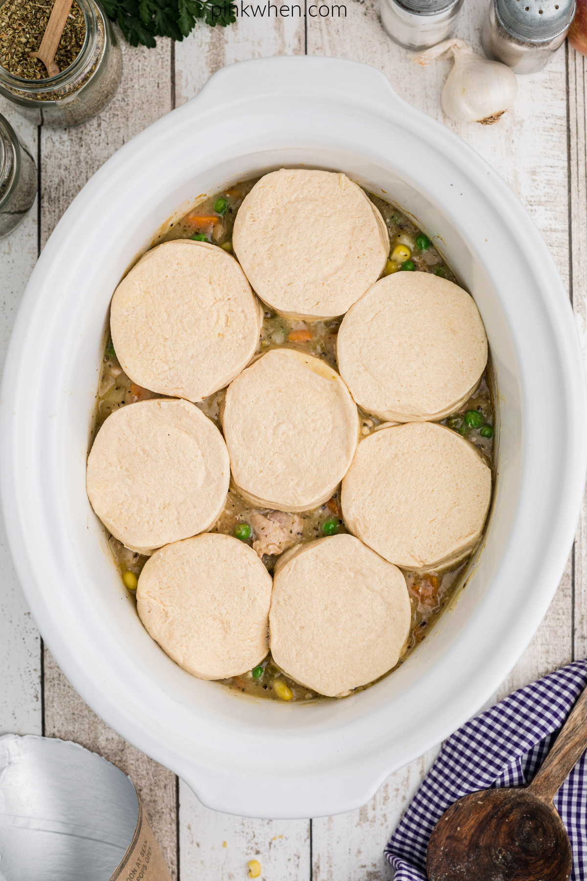 Biscuits on the top of the chicken pot pie mixture.
