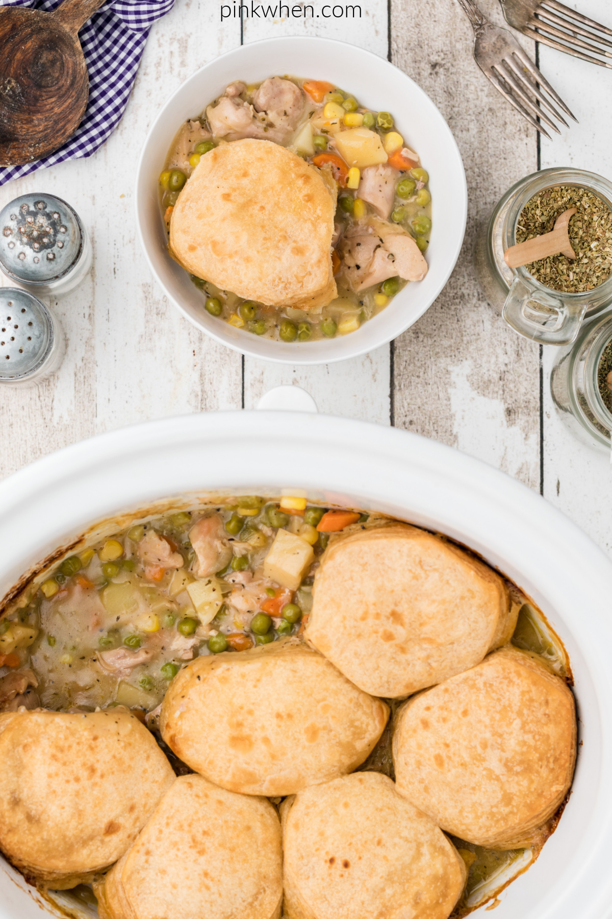 Chicken pot pie in a slow cooker and scooped into a bowl for serving.