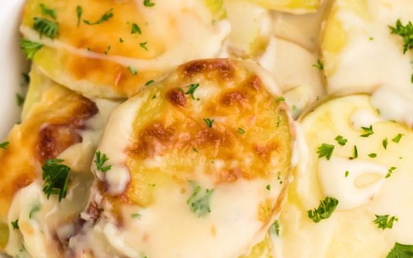 Air fryer scalloped potatoes with herbs.
