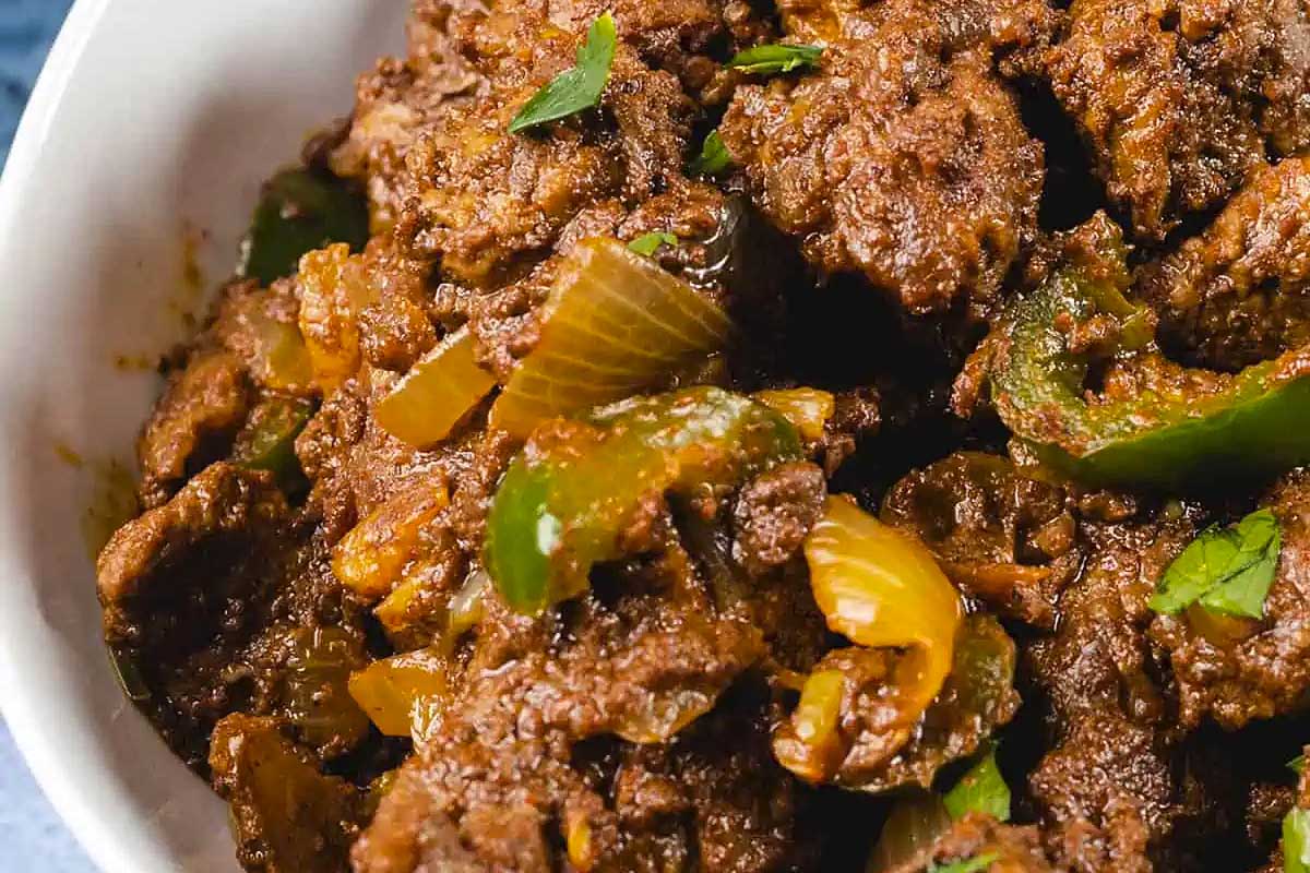 Ethiopian Beef Tibs in a white bowl.