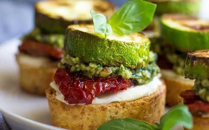 Bruschetta with pesto on top.