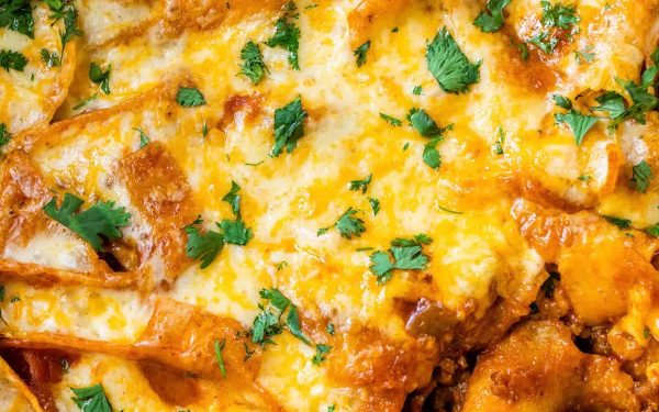 Cheesy beef enchiladas up close.