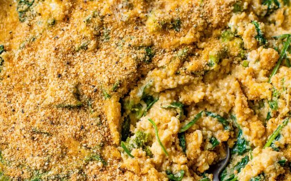Mac and cheese closeup with broccoli and quinoa