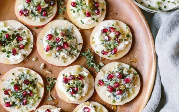 Apple rounds with cheese on top.