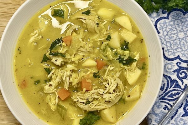 Chicken Mulligatawny Soup in a white bowl.