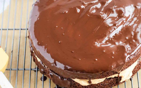 Chocolate Cake with Chocolate Frosting on a cooling rack