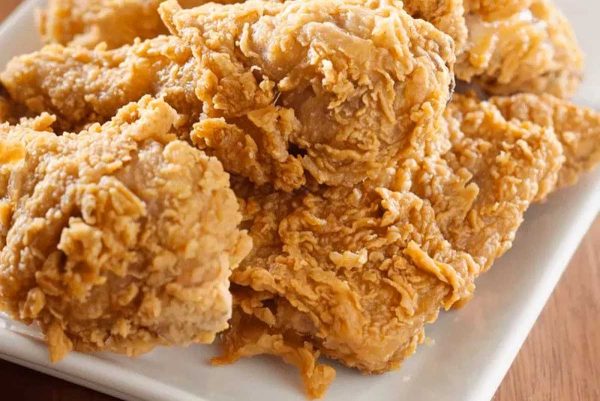 Copycat KFC Chicken on a white plate.