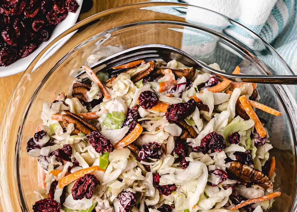 Coleslaw made with cranberries and almonds.