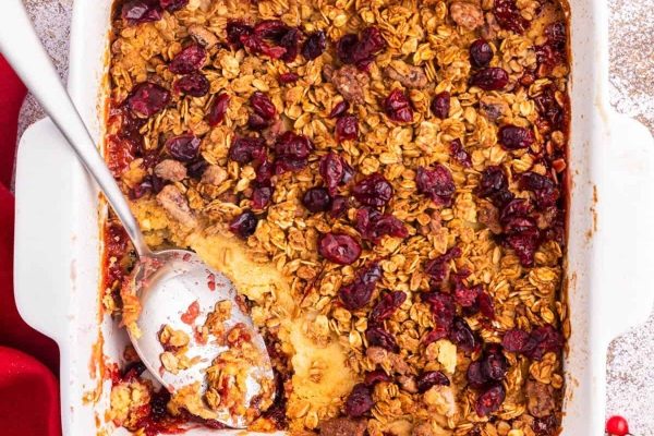 Cranberry dump cake in a casserole dish.