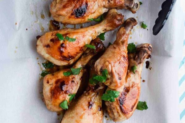 Chicken drumsticks with fresh herbs.
