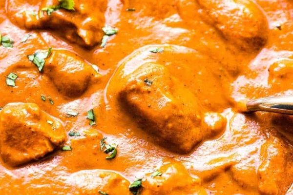 Creamy butter chicken with sauce.
