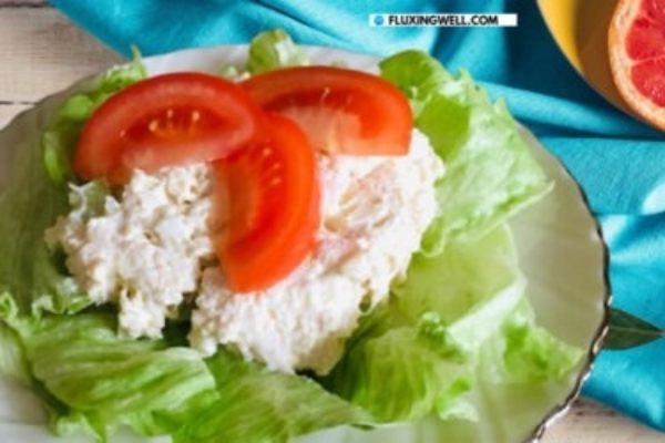 Easy Seafood Salad Recipe served over a bed of lettuce. 