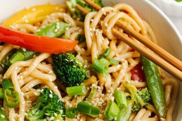 Noodle stir fry with snowpeas, peppers and broccoli.