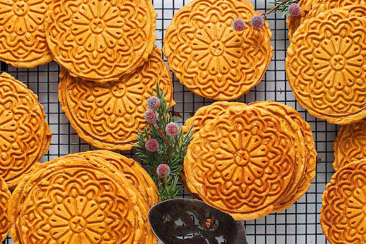 Pizzelle cookies with their distinctive pattern.