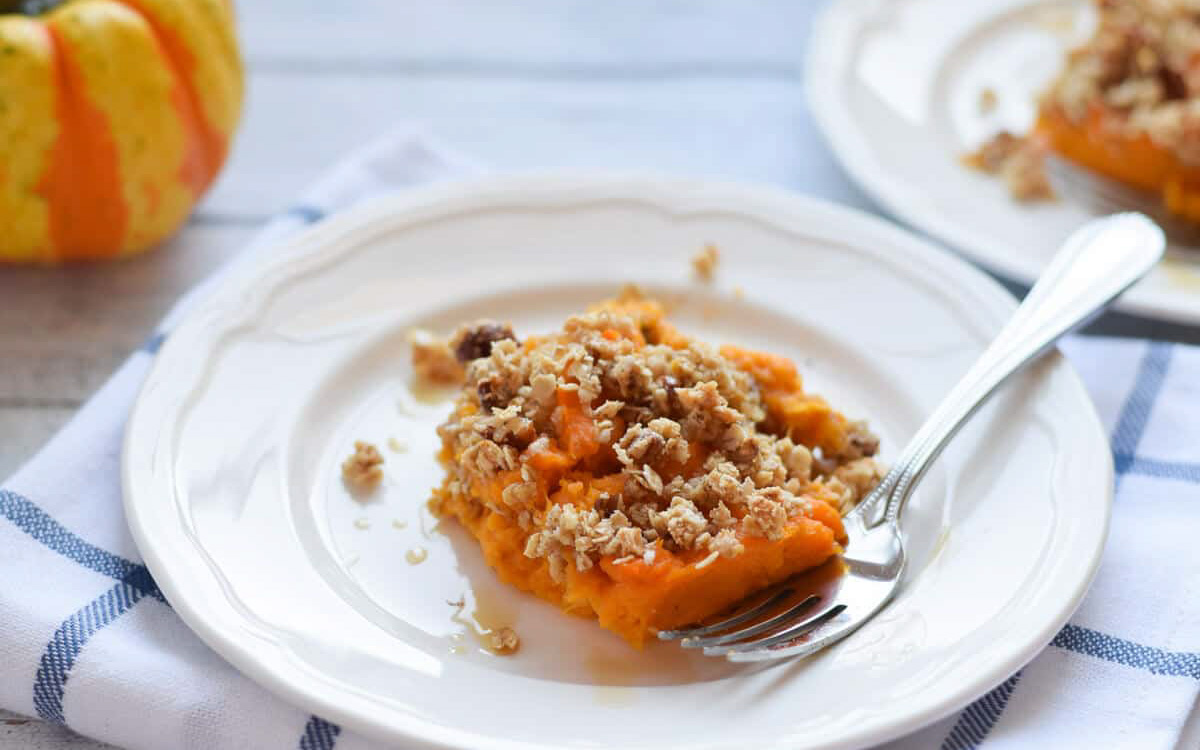 Sweet potato casserole on a white plate.