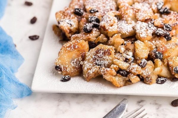 Gluten Free Vegan Kaiserschmarrn with Bananas served on a plate.