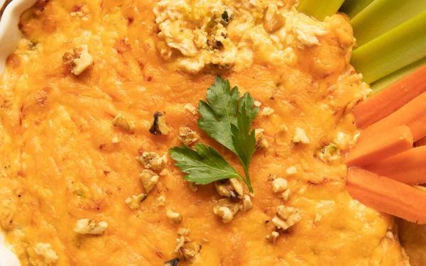 Cheesy chicken dip with vegetables.