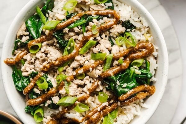 Healthy Ground Pork Stir Fry with Peanut Sauce on a white bowl.