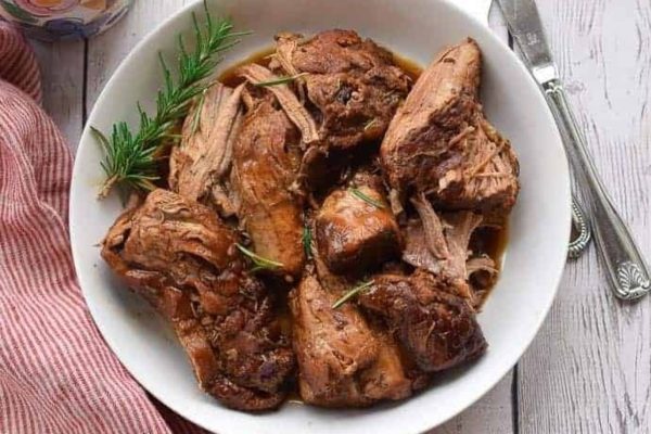 Instant Pot Pork Tenderloin on a white bowl.