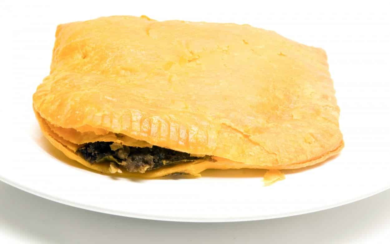 Jamaica’s Meat Patty on a white plate.