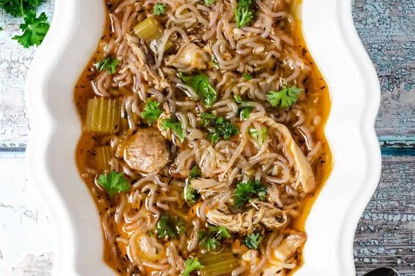 Bowl filled with Keto Chicken Noodle Soup.