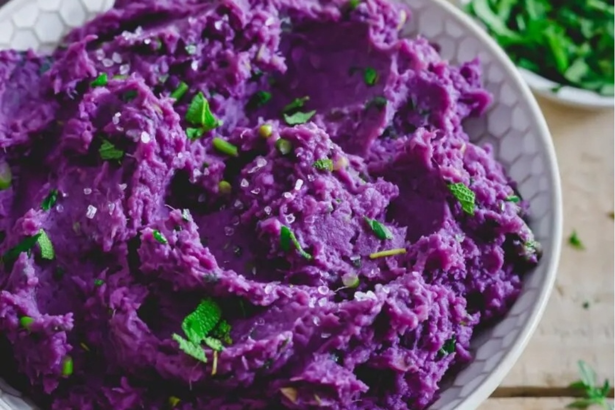 Purple sweet potato mashed potatoes in a bowl.