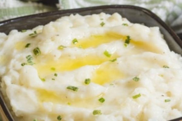 Creamy mashed potato in a small serving bowl. 